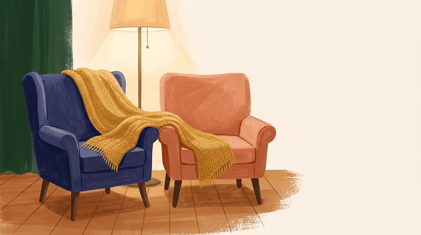 A stylized gouache illustration of two armchairs side-by-side, sharing a cozy yellow blanket in warm, soft-lit room.